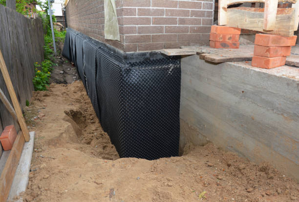 Happy homeowners after waterproofing job in Montevallo